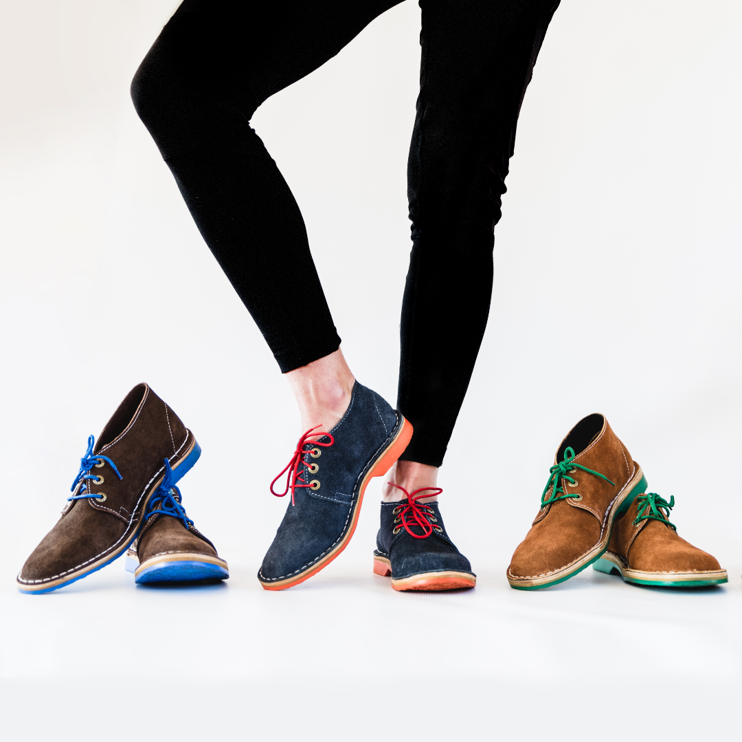 A variety of colourful custom veldskoen shoes designed using Groundcovers custom vellie builder.